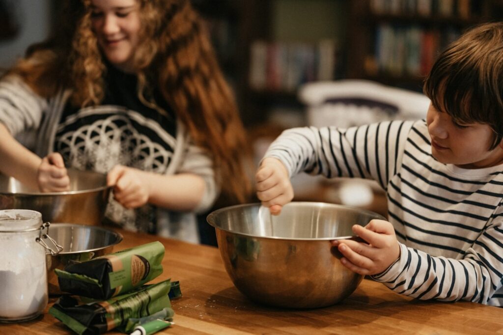 two kids cooking